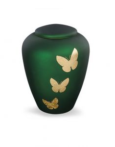 Glazen urn met vlinders groen - symbool van transformatie en vrijheid