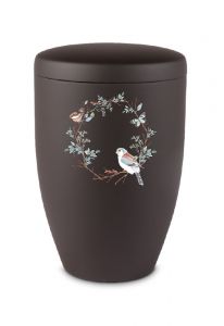 Metalen urn met bloemen, vlinders en vogel