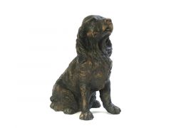 Zittende Cocker Spaniel hondenurn